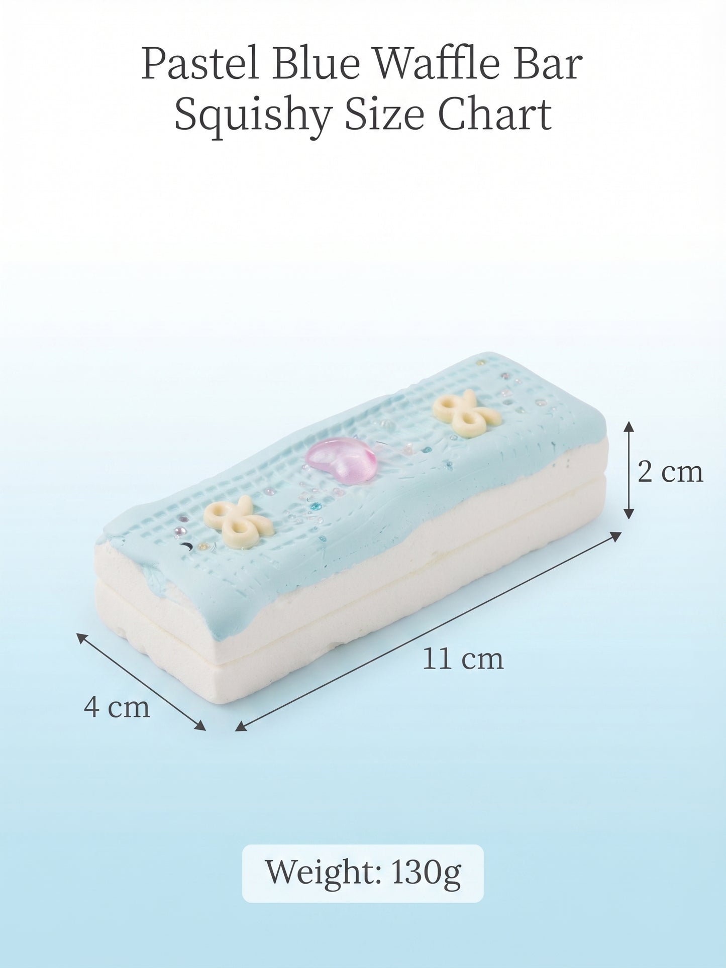 A pastel blue and white waffle bar shaped squishy with small decorative details, shown with dimension arrows and text reading 'Pastel Blue Waffle Bar Squishy Size Chart' and 'Weight: 130g'.