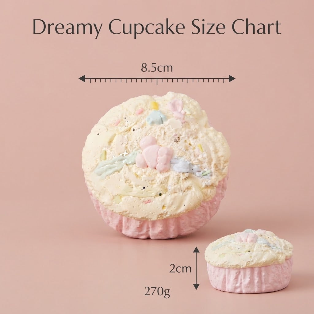 Dreamy Cupcake Size Chart graphic showing a large and small cupcake-shaped item on a dusty pink background, with measurement arrows and text indicating 8.5cm width, 2cm height, and 270g weight.