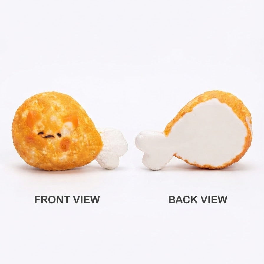A novelty chicken leg-shaped squishy toy shown in two views on a white background: a front view with a cute face and fluffy white tail, and a back view showing a white inner surface with a golden-brown outer edge. Text labels read 'FRONT VIEW' and 'BACK VIEW'.