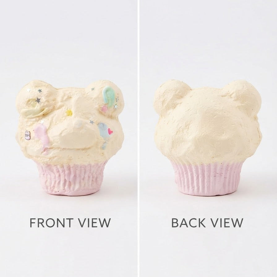 Front and back views of a cupcake-shaped decorative object with a cream-colored top and a light pink wrapper, shown on a plain light background with the labels 'FRONT VIEW' and 'BACK VIEW'.