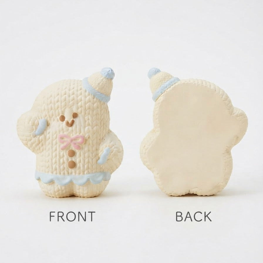 A knitted gingerbread person ornament shown from the front and back on a white background, with 'FRONT' and 'BACK' text labels below.