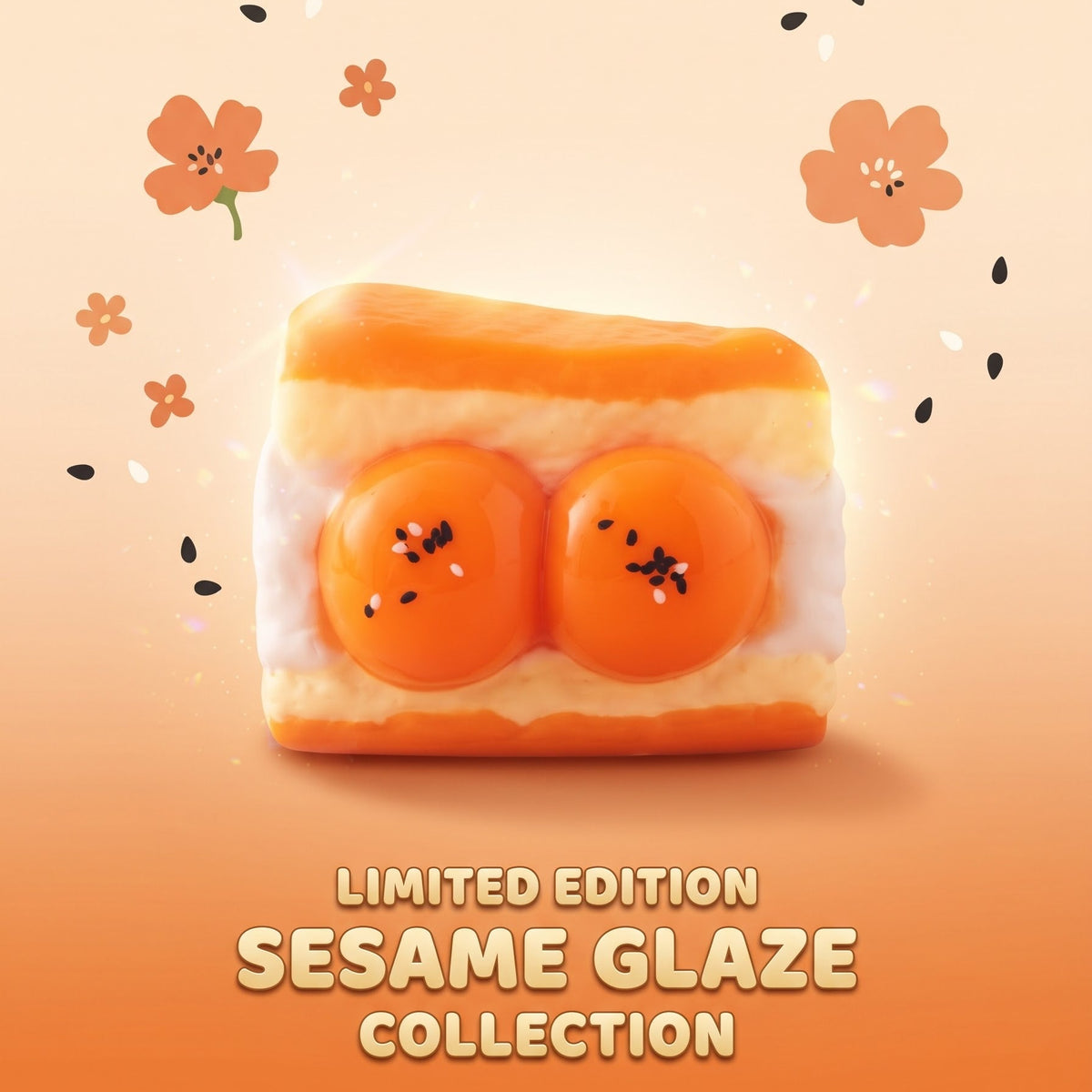 A stylized promotional graphic showing a single orange-brown glazed pastry or dessert with two round orange centers, surrounded by small flower and sesame-like accents on a warm beige-to-orange gradient background. Text at the bottom reads 'LIMITED EDITION SESAME GLAZE COLLECTION'.