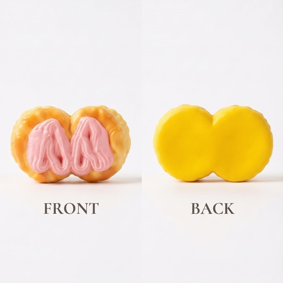 A novelty two-piece squishy toy shown from both sides on a white background. The front side features a yellow outer shell with a pink brain-like center, and the back side is solid yellow.
