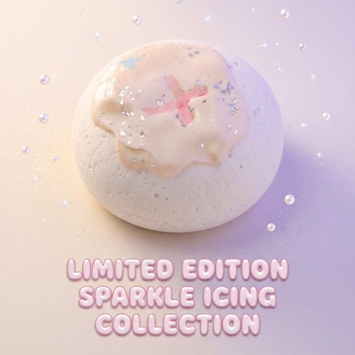 A round bath bomb or decorative product with a pale pink and white iced surface, scattered glitter, and a small pink star detail, shown on a soft pastel background with the text 'LIMITED EDITION SPARKLE ICING COLLECTION' below.