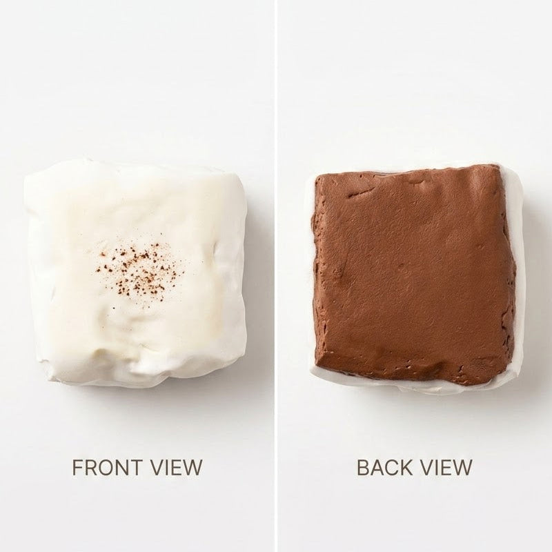 A split-screen product image showing two square marshmallow-shaped items on a white background, labeled FRONT VIEW and BACK VIEW. The left item is off-white with a few brown sprinkles on top, and the right item is medium brown with a white wrapper or edge visible.