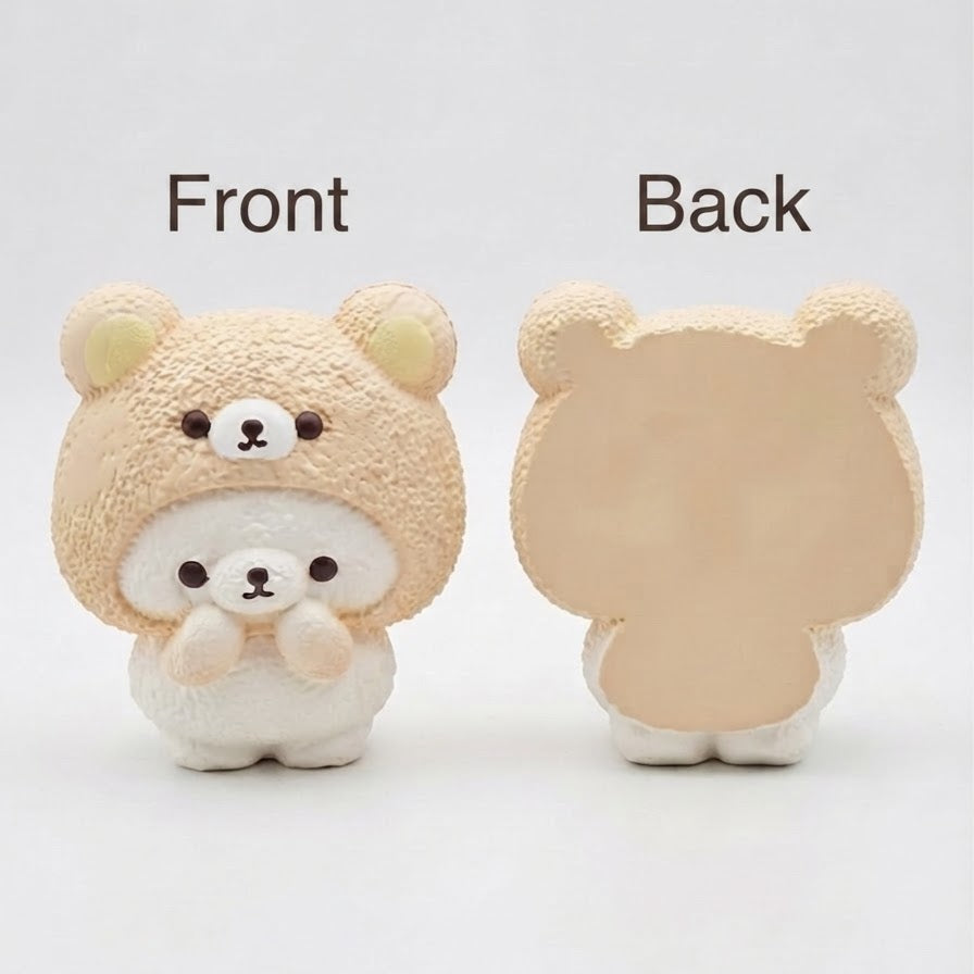 Front and back views of a cute bear-shaped plush toy or figurine on a plain light background. The front view shows a beige fuzzy bear hood with a small white bear face and hands, and the back view shows a plain beige back side.