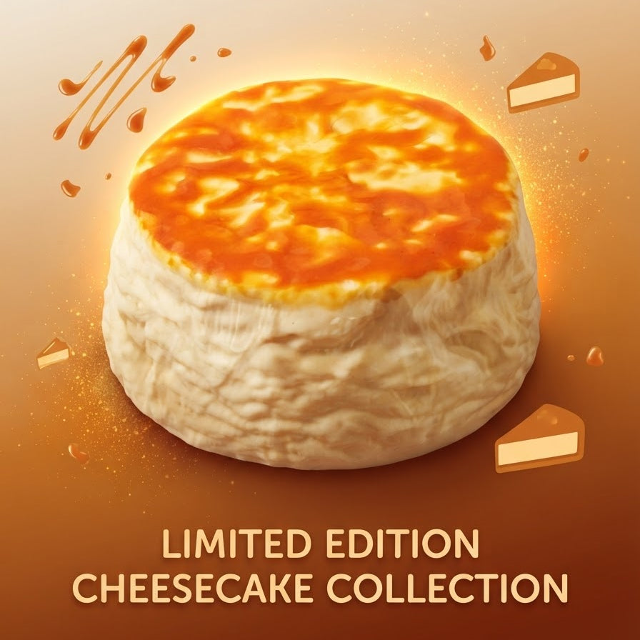A 3D-rendered round cheesecake with a golden-brown baked top and pale cream sides, centered on a warm brown background with decorative slice graphics and the text 'LIMITED EDITION CHEESECAKE COLLECTION' at the bottom.