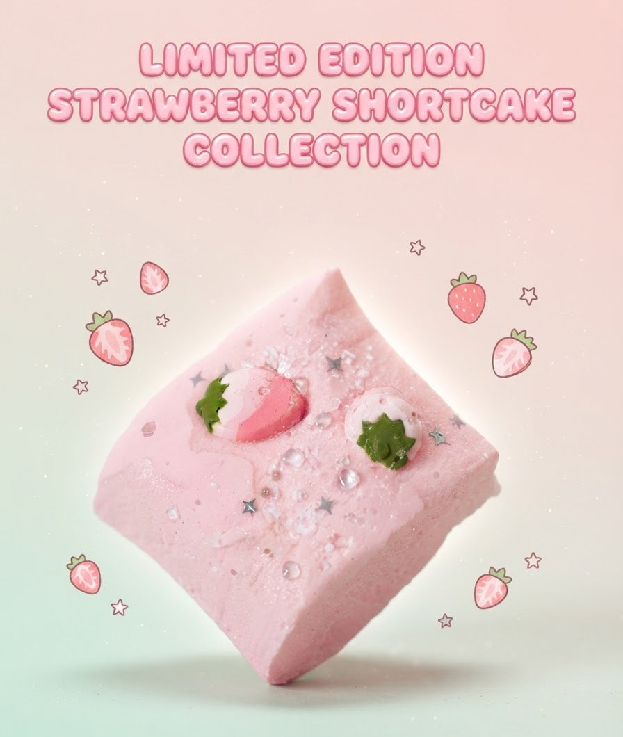 A pink strawberry shortcake-shaped product centered on a soft pastel gradient background with the text 'LIMITED EDITION STRAWBERRY SHORTCAKE COLLECTION' at the top and small strawberry and star illustrations around it.