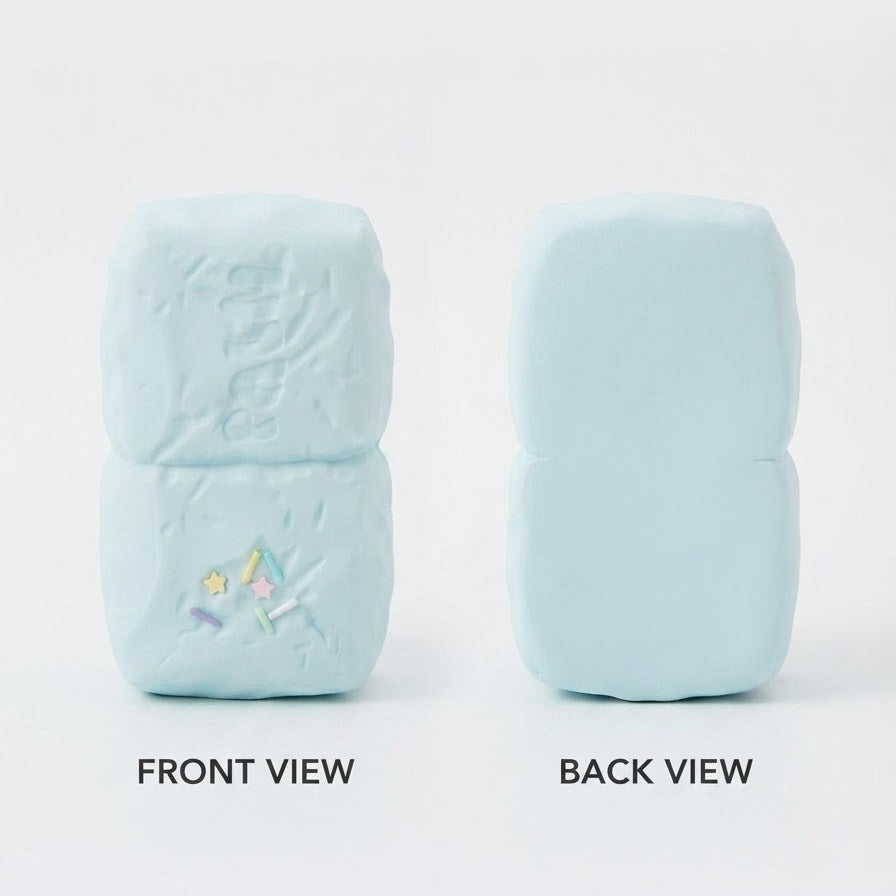 A light blue, blocky, squishy toy or foam product shown from two angles on a white background, labeled 'FRONT VIEW' and 'BACK VIEW'. The front view shows a small colorful floral detail.