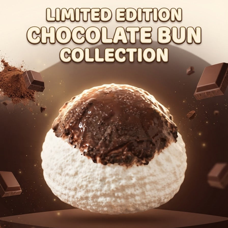 A promotional graphic for a chocolate bun collection, showing a large chocolate-covered bun floating above a dark pedestal with the text 'LIMITED EDITION CHOCOLATE BUN COLLECTION' at the top. Chocolate pieces and cocoa powder are scattered around the bun against a warm brown background.