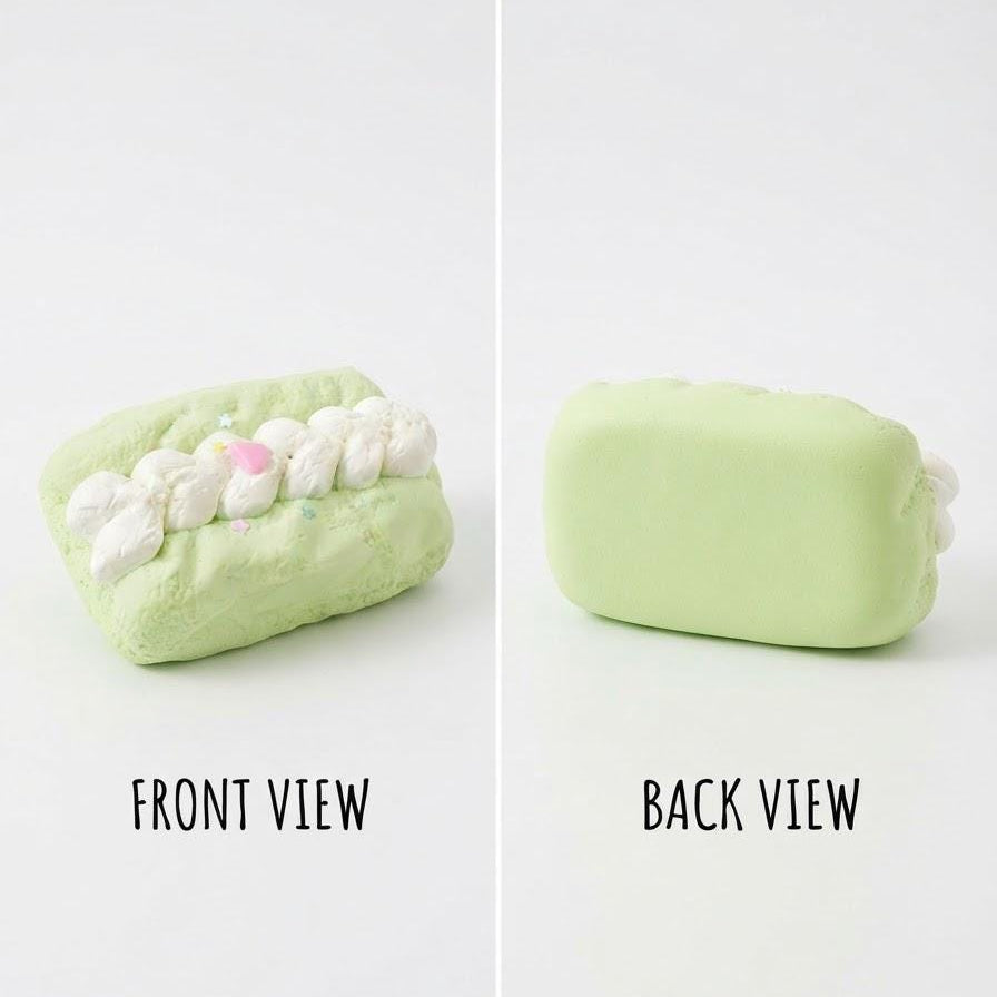 A split-screen product photo showing a pale mint green rectangular item from two angles on a white background. The left side is labeled 'FRONT VIEW' and shows the item with small white textured details and a tiny pink accent.