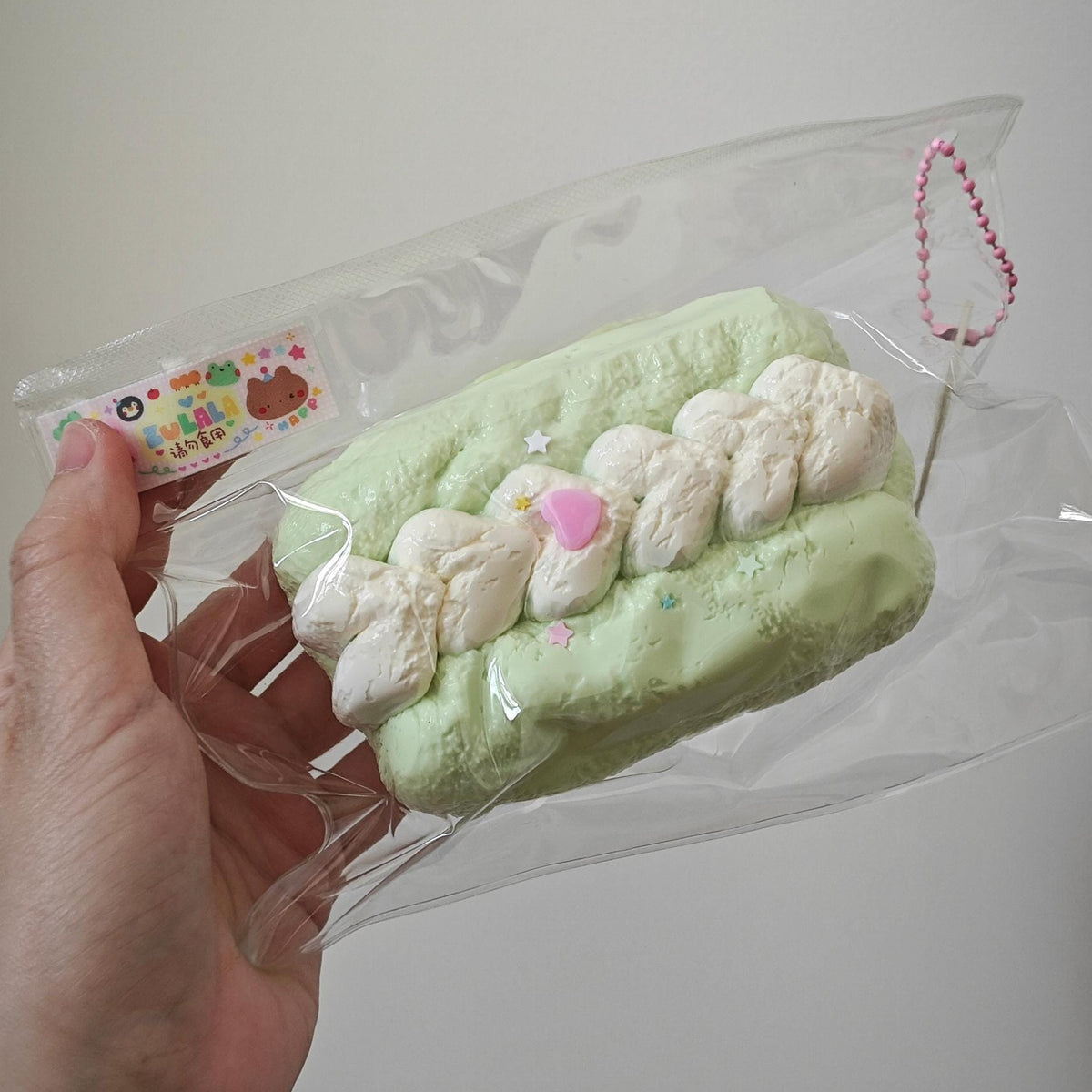 Kawaii Squishy Toy Stress Relief Anxiety Fidget Sensory Ball Keychain Charm Bag Accessory Gift Cute Food Pendant Slow Rise Foam Squish Green Matcha Swiss Roll Cake Design Silicone Construction Pastel Star Details Pink Heart Accent Portable
