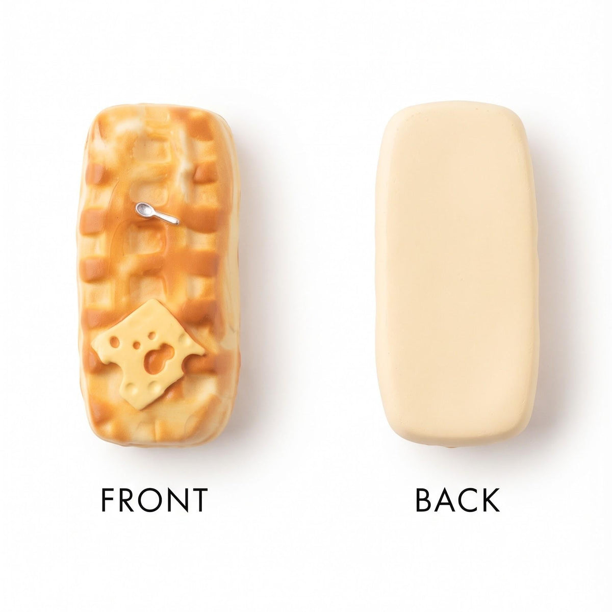 A rectangular novelty candle shown from both sides on a white background. The left side is labeled FRONT and depicts a waffle-patterned golden-brown face with a small cheese slice detail and a silver wick.