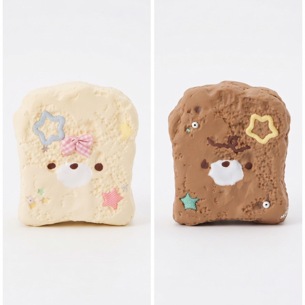 Two cute, bread-shaped squishy toys side by side on a white background. The left one is a pale cream/beige toast with a bear face, a pink bow, and pastel star details.